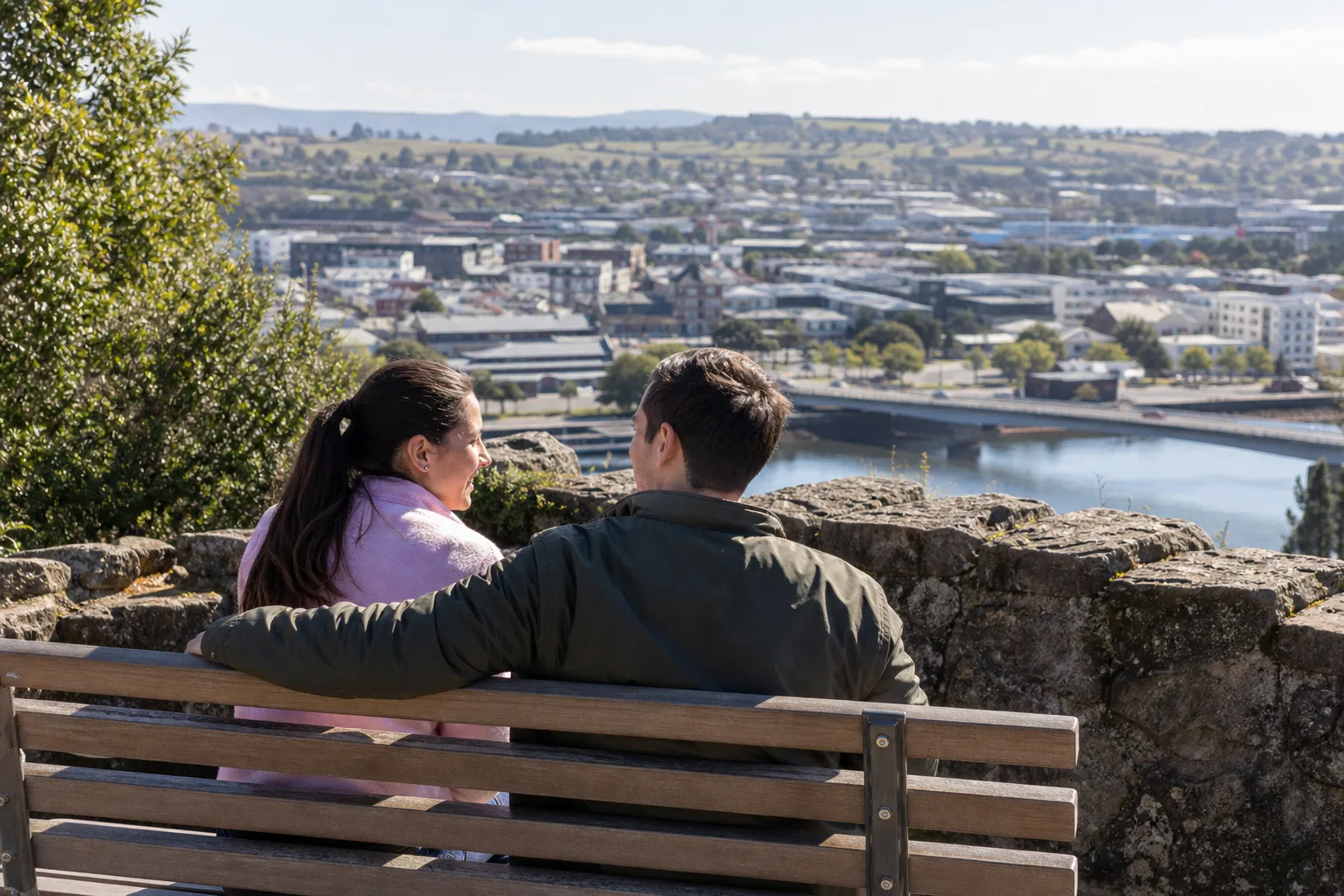 Couple walking beside the water at Cataract Gorge in Launceston